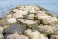 Breakwater by the Mediterranean sea on the island of Ibiza in Sp Royalty Free Stock Photo