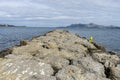 Breakwater by the Mediterranean sea on the island of Ibiza in Sp Royalty Free Stock Photo