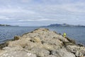 Breakwater by the Mediterranean sea on the island of Ibiza in Sp Royalty Free Stock Photo