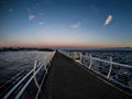 Breakwater at the Ogden Point in Victoria, BC, Canada; sunset ti