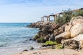 Breakwater overlooking the sea with a promenade terrace on the waterfront of Nahariya city in Israel Royalty Free Stock Photo