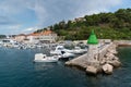 Breakwater and port in the town of Jelsa on the island of Hvar in Croatia Royalty Free Stock Photo