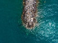 Breakwater, stones and embankment. Top view, Summer sea beach. Parking for boats. Storm embankment. Boats and fishermen. People ar Royalty Free Stock Photo