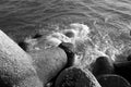 Breakwater stones on mole at Black sea in black and white Royalty Free Stock Photo