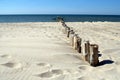 Breakwater and sunny beach