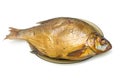 Bream fish smoked on a plate on a white background