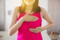 Breast cancer awareness concept,Happy asian woman hands holding on breast,Great for prevention cancer concept Royalty Free Stock Photo