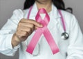 Breast cancer awareness pink ribbon raising awareness on woman health and female illness in October month Royalty Free Stock Photo