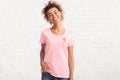 Breast Cancer Volunteer Girl Smiling Posing Over White Brick Wall Royalty Free Stock Photo
