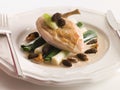 Breast of Chicken with Morels Baby Leeks Royalty Free Stock Photo