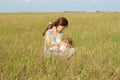 Breast feeding in the nature Royalty Free Stock Photo