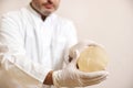 Closeup of breast implant in plastic surgeon hands. Concept of plastic surgery and breast augmentation Royalty Free Stock Photo