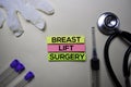 Breast Lift Surgery text on Sticky Notes. Top view isolated on office desk. Healthcare/Medical concept Royalty Free Stock Photo