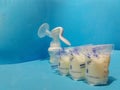 Breast milk in storage bags and breast pump Royalty Free Stock Photo