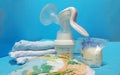 Breast milk in storage bags and breast pump Royalty Free Stock Photo