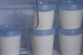 Breast milk storage containers stored in freezer