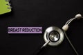 Breast Reduction on top view black table and Healthcare/medical concept Royalty Free Stock Photo