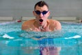 Breaststroke in indoor pool