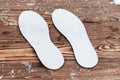 . Breathable insoles for shoes on wooden background. have toning Royalty Free Stock Photo