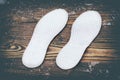 . Breathable insoles for shoes on wooden background. have toning Royalty Free Stock Photo