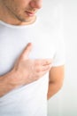Breathing problem. Sick middle-aged man with chest pain touching inflammated zone. Royalty Free Stock Photo