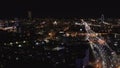 Breathtaking aerial night panoramic view of a big city. Stock footage. Flying over streets with beautiful illumination Royalty Free Stock Photo