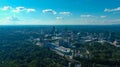 A breathtaking aerial shot of the cityscape of Brookhaven with buildings and vast miles of lush green with blue sky Royalty Free Stock Photo