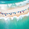 A breathtaking aerial view of a beach paradise with many colorful umbrellas and enjoying various leisure activities is