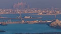 A breathtaking aerial view of the Palm Jumeirah during sunrise from a rooftop, Dubai, United Arab Emirates Royalty Free Stock Photo