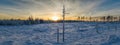 Breathtaking Aerial Winter Sunset panorama photo from low height over Snow Covered Forest Landscape In Northern Sweden, Umea. Royalty Free Stock Photo