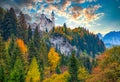 Breathtaking autumn scenery of Neuschwanstein Fairytale Castle at sunrise, Bavaria, Germany Royalty Free Stock Photo
