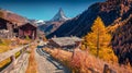 Breathtaking autumn view of Zermatt village with Matterhorn Monte Cervino, Mont Cervin peak on backgroud.