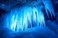 A breathtaking 3D background of an ice cavern illuminated by glowing blue crystals. Jagged icicles Royalty Free Stock Photo