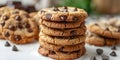 Breathtaking graphic photo of a stack of chocolate chip cookies on a white background with natural light and a blurred kitche Royalty Free Stock Photo