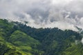 Breathtaking Green Landscape with Foggy Mountains and Waterfalls during Monsoon in Nepal Royalty Free Stock Photo