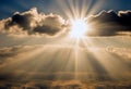 Celestial Brilliance: Sunburst Through Clouds Royalty Free Stock Photo