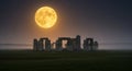 Stonehenge under a Giant Full Moon Royalty Free Stock Photo