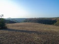 Awe-Inspiring Vistas: A Valley and Mountains in the Distance Royalty Free Stock Photo