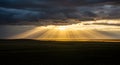 Golden Rays Through Storm Clouds Royalty Free Stock Photo