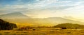 Breathtaking lansdcape of Austrian countryside on sunset. Dramatic sky over idyllic green fields of Anstrian Central Alps on autum Royalty Free Stock Photo