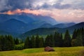 Breathtaking lansdcape of Bavarian mountains and forests on cloudy sunset. Scenic view of Bavarian Alps with majestic mountains in