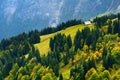 Breathtaking lansdcape of mountains, forests and small Bavarian villages in the distance. Scenic view of Bavarian Alps with majest