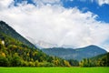 Breathtaking lansdcape of mountains, forests and small Bavarian villages in the distance. Scenic view of Bavarian Alps with majest