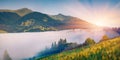 Breathtaking morning scene of Carpathians. Foggy sunrise in mountains, Rika village location, Transcarpathians, Ukraine, Europe. B Royalty Free Stock Photo