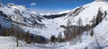 breathtaking mountain landscape near the alp Sertig. Snow mountains with Sun, Snow a river and beautiful trees, Swiss Royalty Free Stock Photo