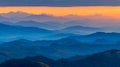 Breathtaking Mountain Landscape at Sunset with Multiple Mountain Ranges and a Vibrant Sky. Royalty Free Stock Photo