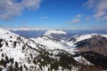 Breathtaking panorama of the European Alps mountain range in winter with snow-capped peaks Royalty Free Stock Photo