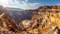 Vast OpenPit Mine Carved into a Rocky Landscape Royalty Free Stock Photo