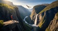 Majestic Mountaintop View Hiker Waterfall and Eagle in Norway Royalty Free Stock Photo