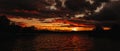 Breathtaking panotamic view of the red sunset over the sea Royalty Free Stock Photo